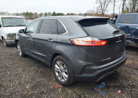 2022 Ford Edge Titanium z USA, uszkodzony, nr VIN 2FMPK4K90NBA35277